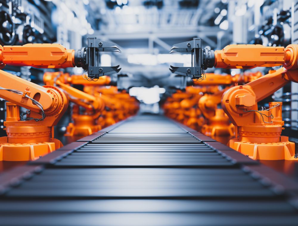 Robotic Arms Along Assembly Line In Modern Factory X4A22ZU 1 1